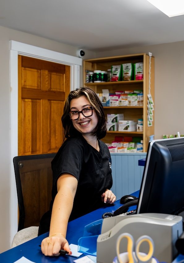 happy-front-desk-team-member